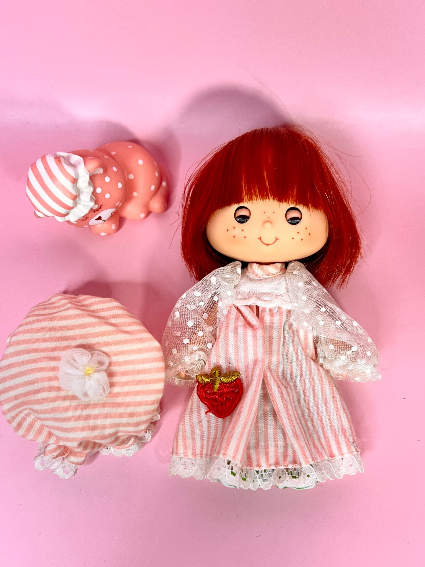 Vintage Strawberry Shortcake Sweet Sleeper doll with pet Custard the Cat from the 1980s Strawberry Shortcake Series
