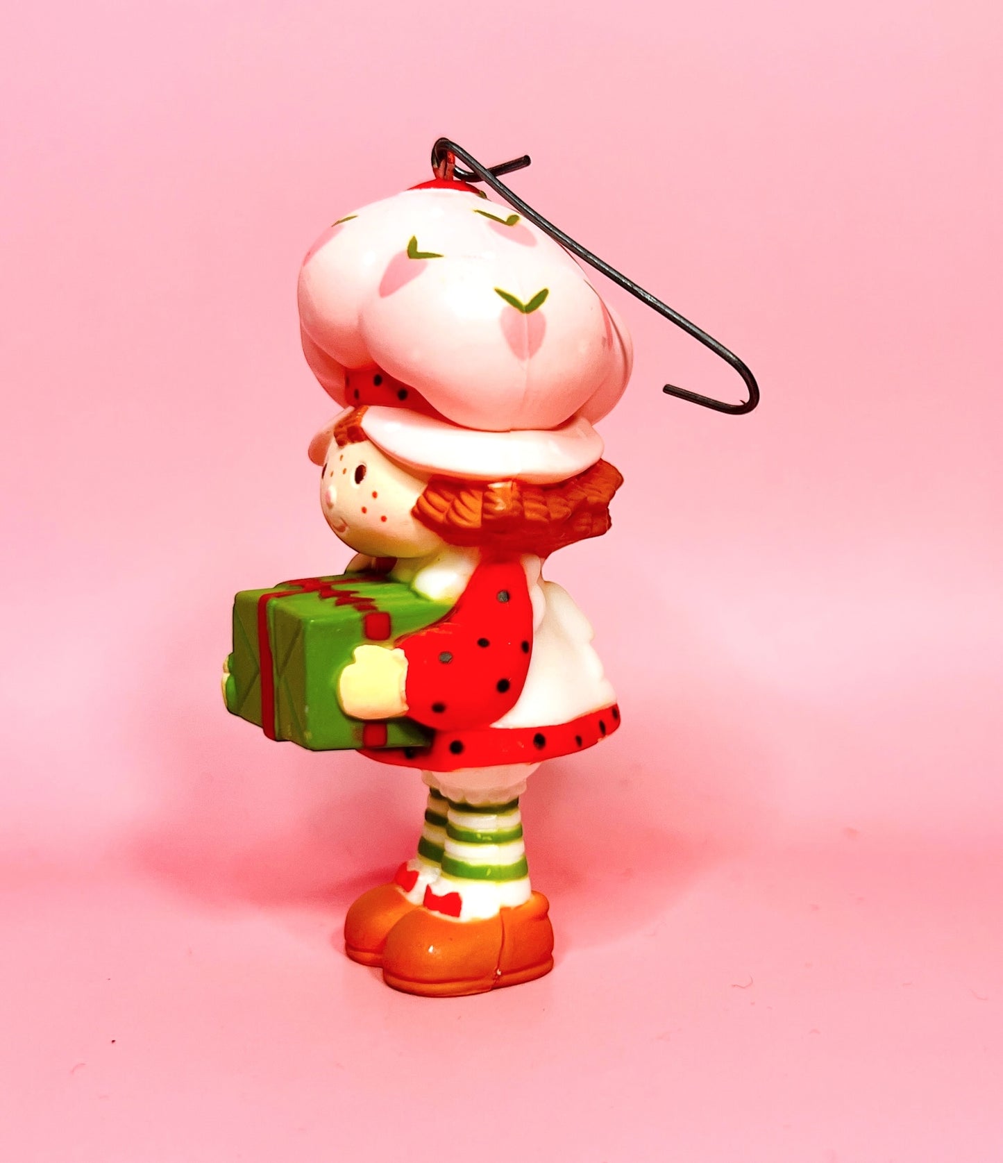 1980 Vintage Strawberry Shortcake Ceramic Christmas Ornament: Strawberry Herself with Green Present