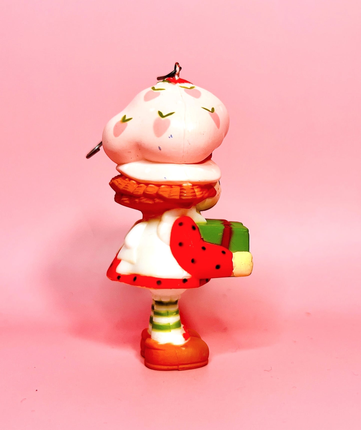 1980 Vintage Strawberry Shortcake Ceramic Christmas Ornament: Strawberry Herself with Green Present