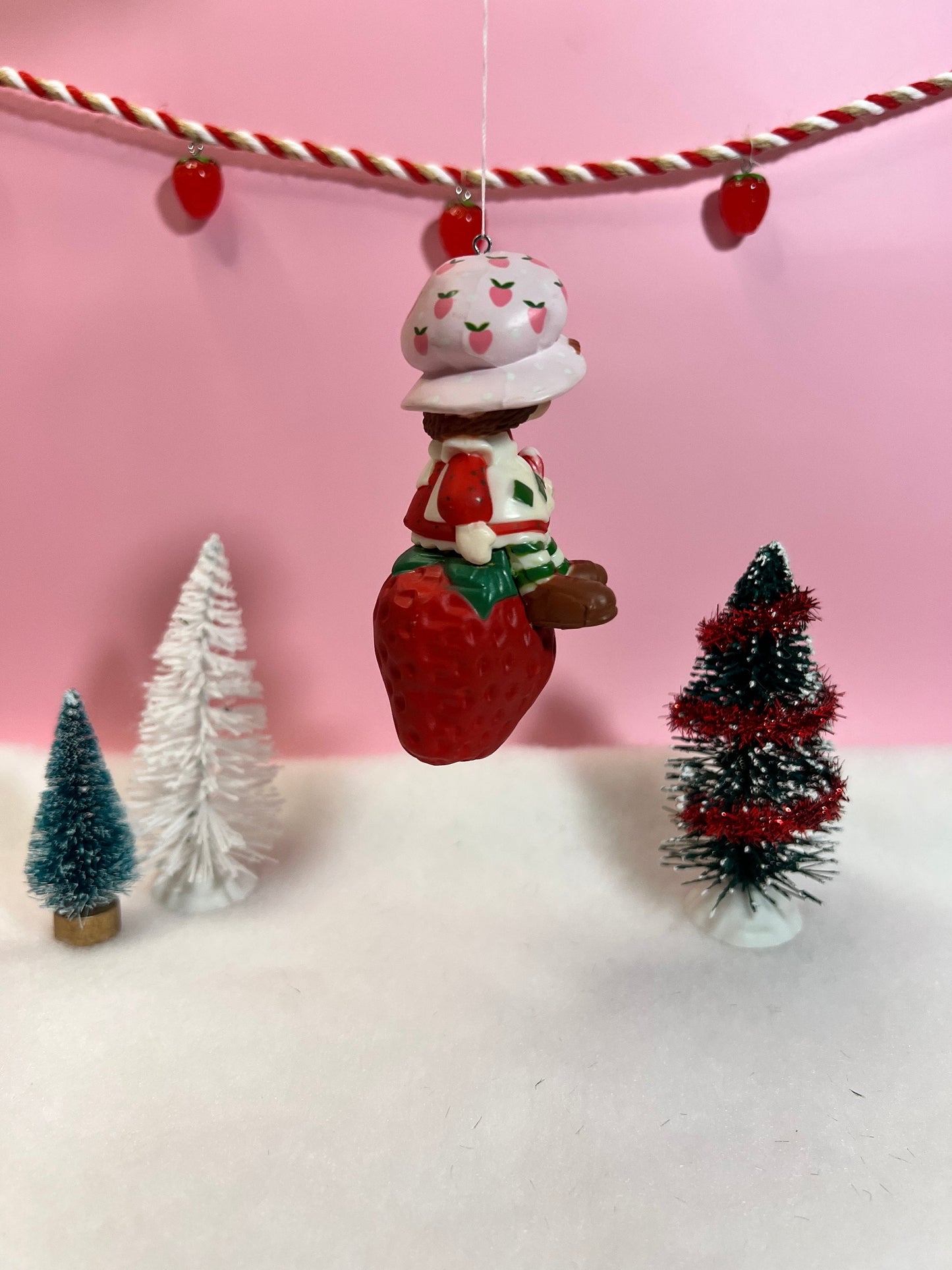 Boxed 1982 Vintage Strawberry Shortcake Ceramic Christmas Ornament: Strawberry Herself with Candy Cane sitting on a Strawberry! - Dolly Magic