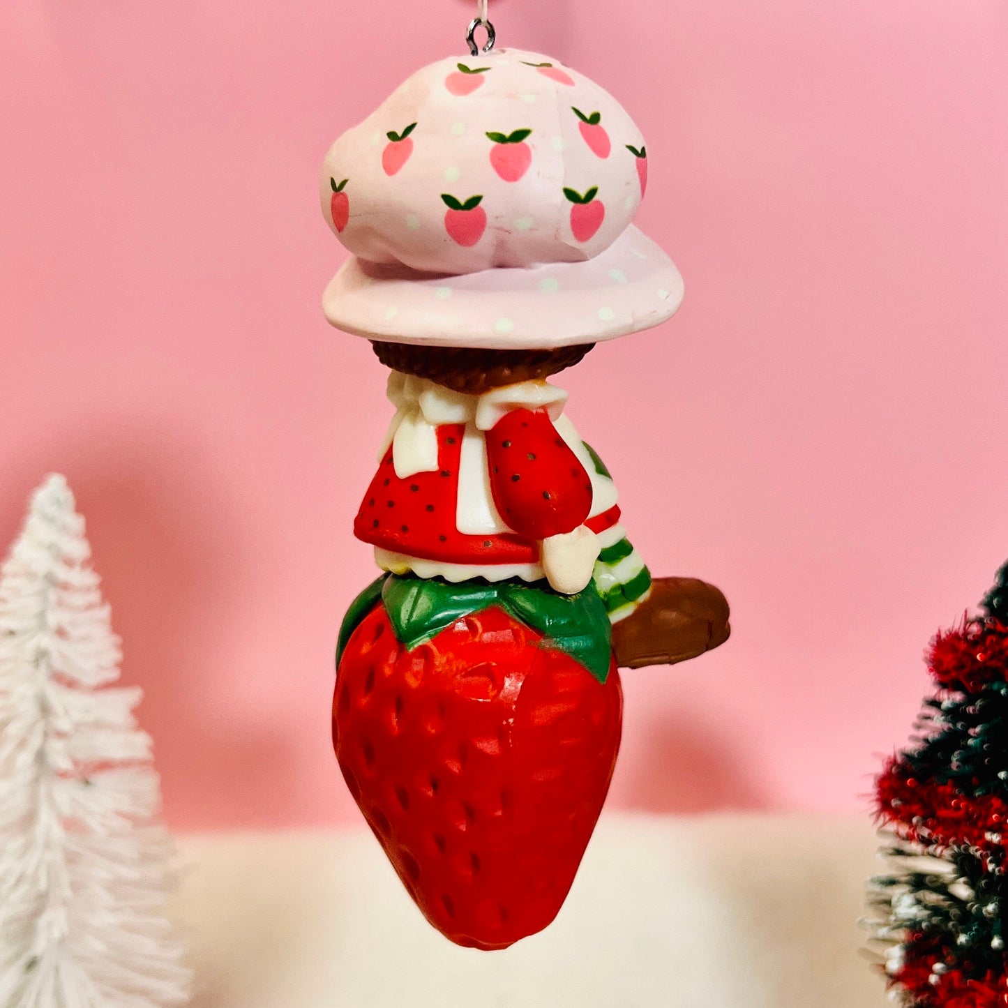 Boxed 1982 Vintage Strawberry Shortcake Ceramic Christmas Ornament: Strawberry Herself with Candy Cane sitting on a Strawberry! - Dolly Magic
