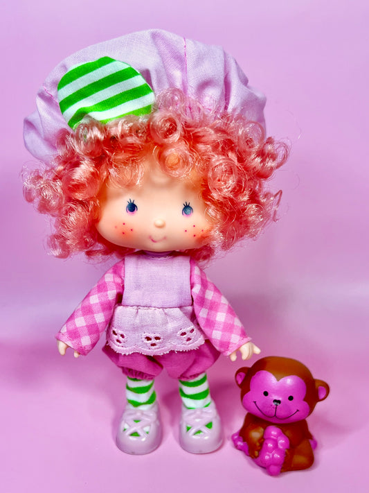 Vintage Raspberry Tart doll with pet Rhubarb Monkey from the 1980s Strawberry Shortcake Series