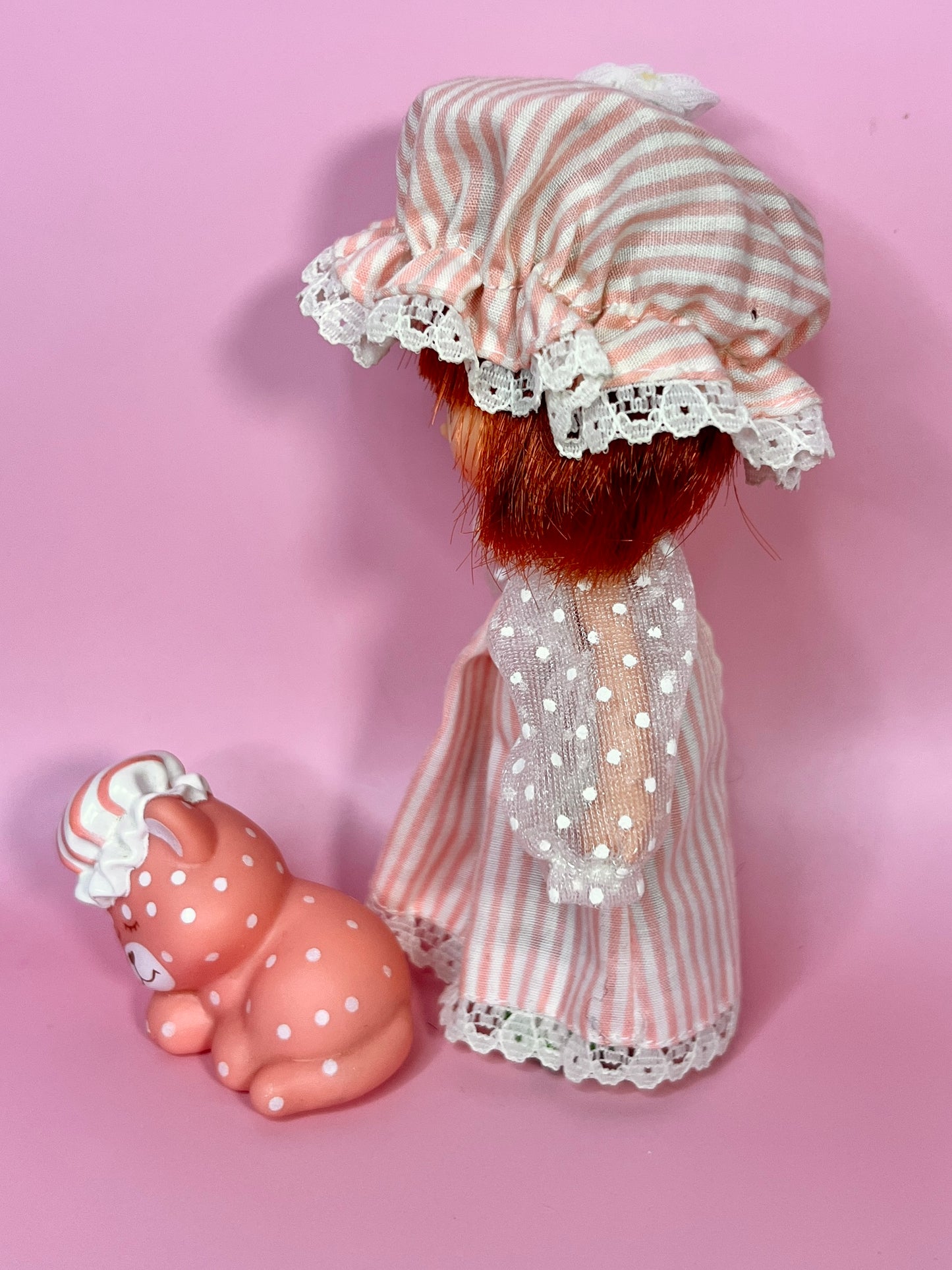 Vintage Strawberry Shortcake Sweet Sleeper doll with pet Custard the Cat from the 1980s Strawberry Shortcake Series