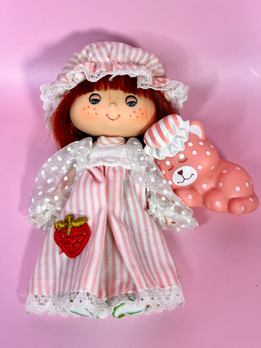 Vintage Strawberry Shortcake Sweet Sleeper doll with pet Custard the Cat from the 1980s Strawberry Shortcake Series