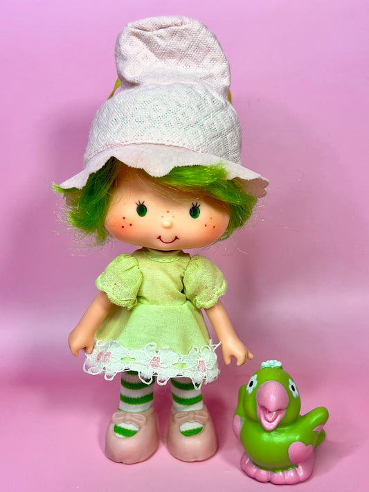 Vintage Lime Chiffon doll with pet Pafait Parrot from the 1980s Strawberry Shortcake Series