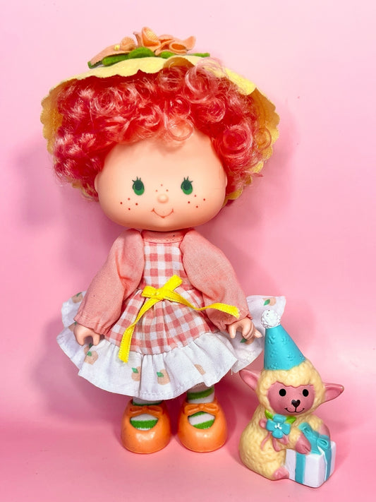 Vintage Peach Blush doll and pet lamb Melonie Belle from the 1980s Strawberry Shortcake Series